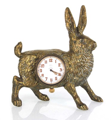 Lot 55 - A German brass watch holder modelled as a...