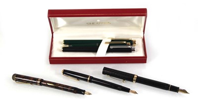 Lot 68 - A cased group of four Sheaffer pens including...