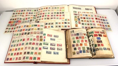 Lot 77 - A group of stamps contained in five albums and...