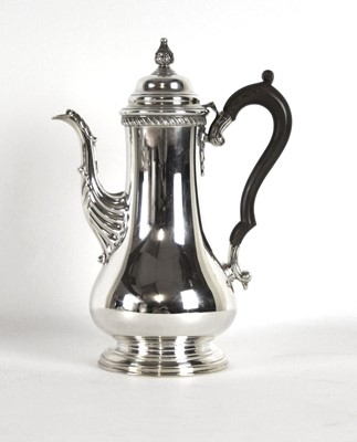 Lot 242 - A silver coffee or hot water pot, Birmingham...