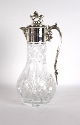 Lot 243 - A silver mounted claret jug inscribed 'Horse...