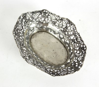 Lot 246 - A Continental metalwares pierce-work dish...