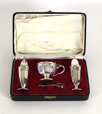 Lot 256 - A cased Viners Ltd silver cruet set, Sheffield...