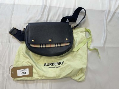 Lot 1359 - Burberry handbag in black with dust bag (signs...
