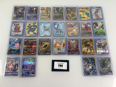 Lot 1104 - Approx. 25 Top Loaded Pokémon cards from...