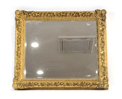 Lot 8 - An early 20th century gilt plaster wall mirror,...