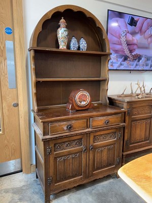 Lot 1004 - Dark oak dresser with linen fold doors