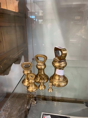 Lot 1012 - Graduated set of brass weights