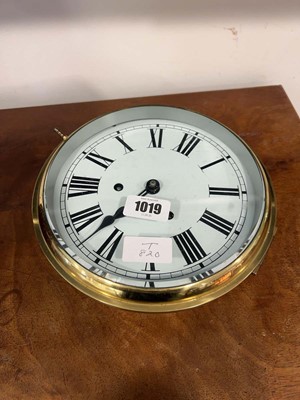 Lot 1019 - Circular brass clock