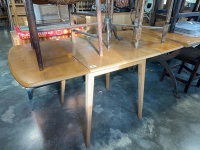 Lot 1020 - Blonde Ercol drop leaf dining table