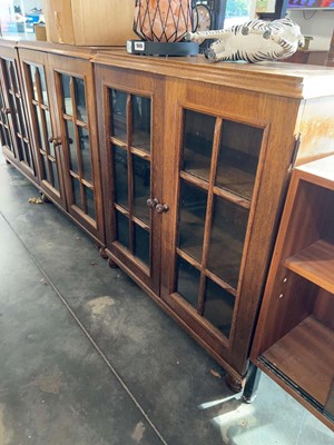 Lot 1025 - Dark oak open fronted bookcase with glazed...