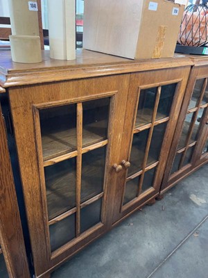 Lot 1026 - Dark oak open fronted bookcase with glazed...