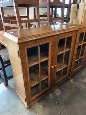 Lot 1027 - Dark oak open fronted bookcase with glazed...