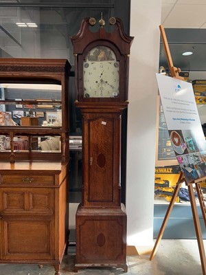 Lot 1034 - Dark oak cased Grandfather clock. The face...