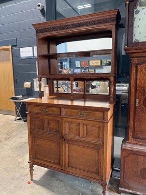 Lot 1035 - Dark oak mirrored back sideboard with upper...