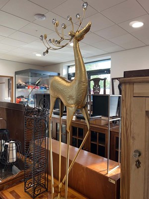 Lot 1042 - Freestanding gold coloured reindeer ornament