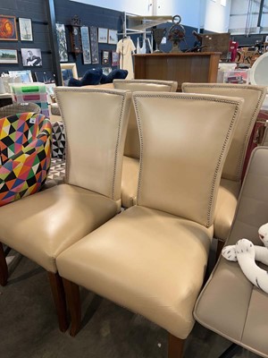 Lot 1059 - Set of 4 cream leather upholstered and chrome...