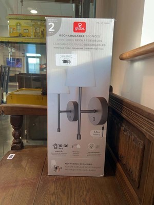 Lot 1065 - Pack of 2 globe rechargeable wall sconces