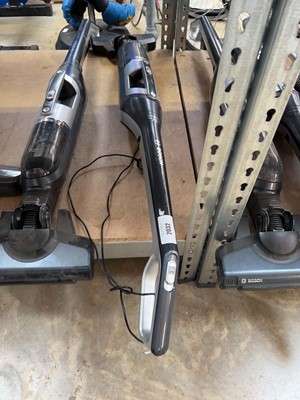 Lot 2032 - 2 Bosch Aflette cordless upright vacuum...