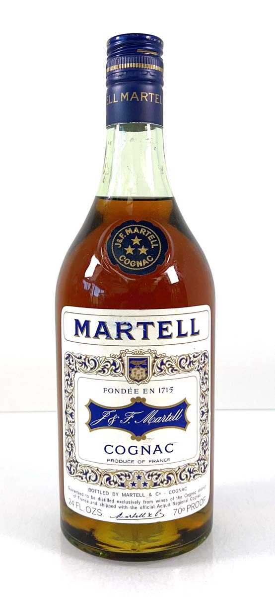 Lot 74 - A bottle of Martell 3 star Cognac 70 proof 24...