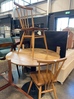 Lot 1176 - Circular single pedestal composite wood dining...