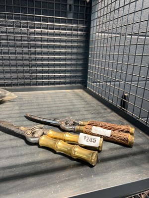 Lot 1245 - Bone handled pair of secateurs and a similar...