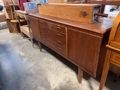 Lot 1123 - Mid century teak sideboard with 4 central...