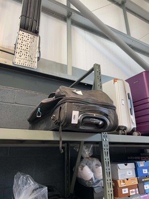 Lot 1462 - Wheeled tug along sports case with one further...