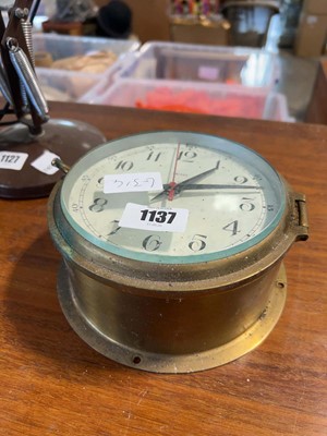 Lot 1137 - Battery powered Smiths clock in circular brass...