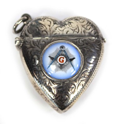 Lot 221 - A silver vesta case of heart shaped from...