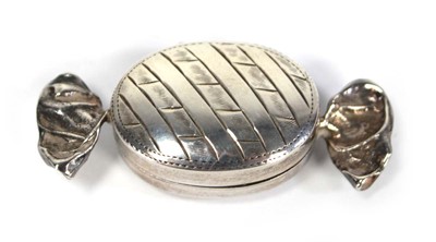 Lot 223 - A metalware pill box of sweet shaped form, w....