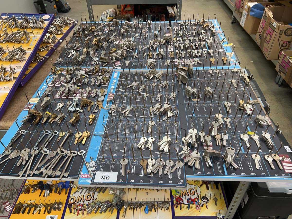 Lot 2319 - 6 wall mounted shop display racks containing a...