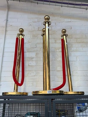 Lot 2556 - Set of 4 brass coloured plastic freestanding...