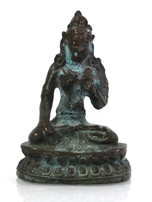Lot 87 - A South East Asian bronze figure modelled as...