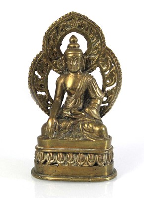 Lot 89 - A South East Asian brass figure modelled as a...
