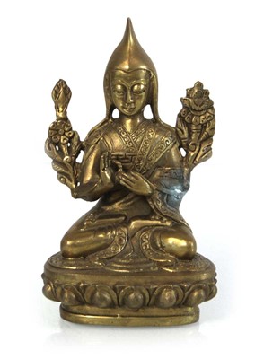 Lot 90 - A brass-finished Tsongkhapa figure modelled as...