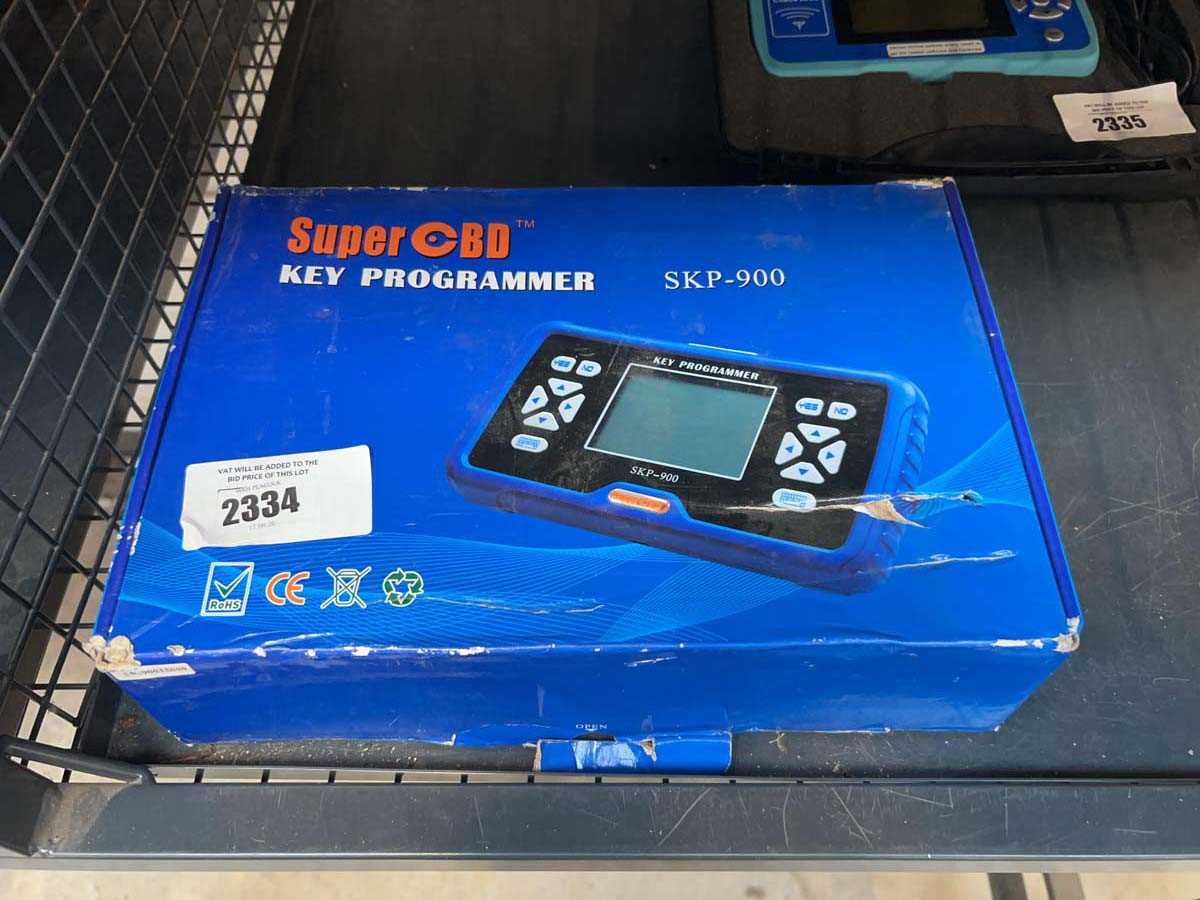 Lot 2334 - SuperOBD SKP-900 handheld OBD2 car key and...