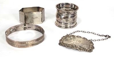 Lot 246 - A silver decanter label, maker DJS, London...