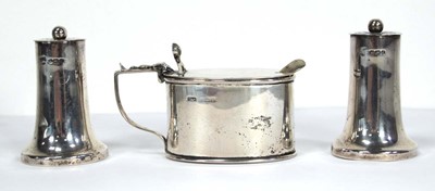 Lot 249 - A silver mustard of oval form and a pair of...