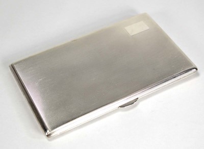 Lot 258 - A silver engine turned cigarette case of...