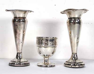 Lot 266 - A silver egg cup relief decorated with Captain...