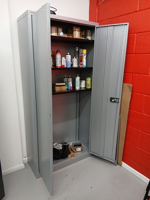 Lot 110 - Bisley silver 2-door cabinet with contents to...
