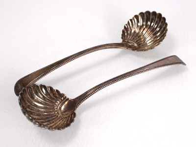 Lot 300 - A pair of George III silver old English...
