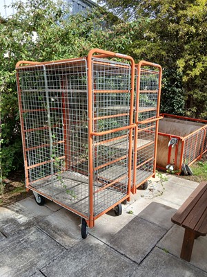 Lot 224 - 3 red frame mobile cages on heavy duty castors