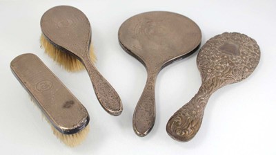 Lot 309 - Two early 20th century silver back hairbrushes...