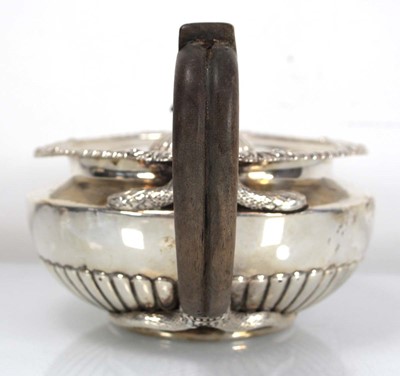Lot 312 - A George III silver teapot of squat form with...