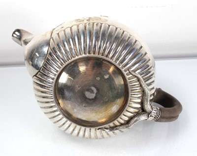 Lot 312 - A George III silver teapot of squat form with...