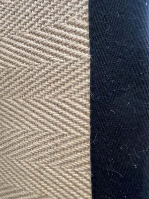 Lot 5007 - Large square herringbone patterned rug with...