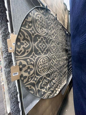 Lot 5022 - Medium circular rug in grey with geometric...