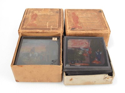 Lot 42 - Two sets of magic lantern slides 'The...